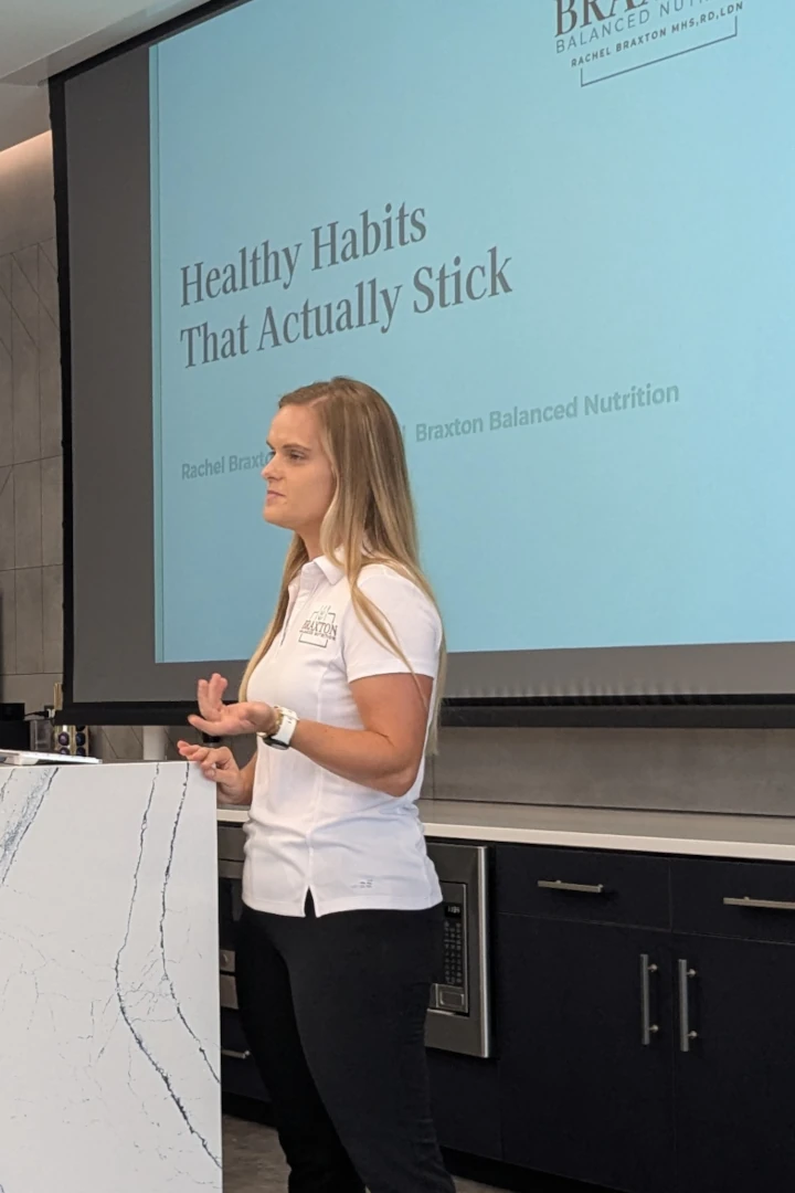 Rachel presenting a lunch and learn on healthy habits that actually stick.